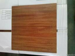 Pake laminant Resiliant textile and laminate floor covering