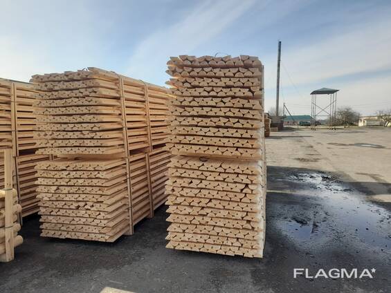 Деревянные опоры, бревна оцилиндрованые