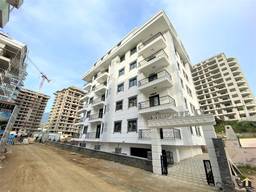 Двухкомнатная квартира в новом комплексе в центре Махмутлара (30599)